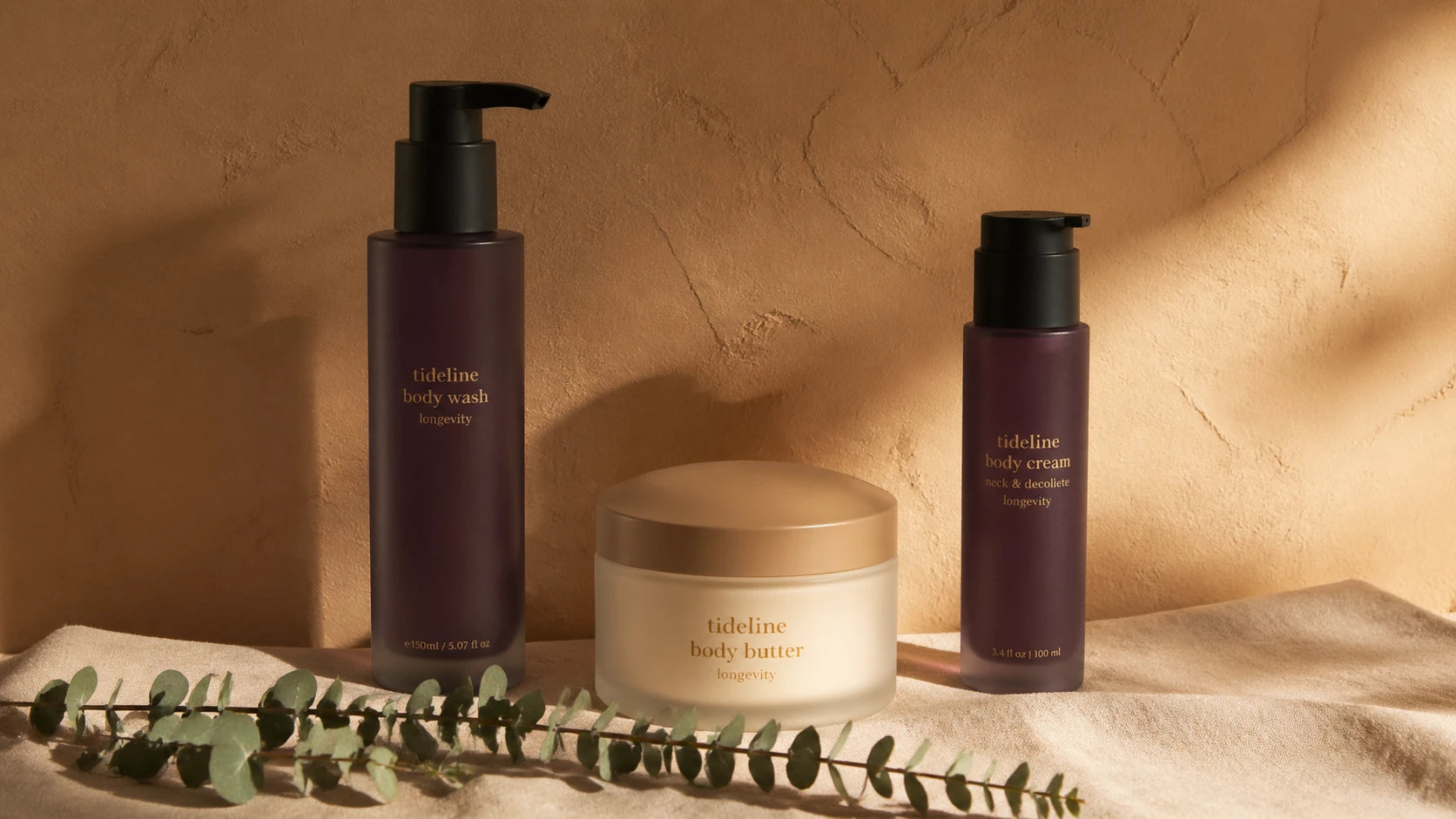 Tideline Daily Trio: wash, butter and cream on bone-cream linen with saffron horizon