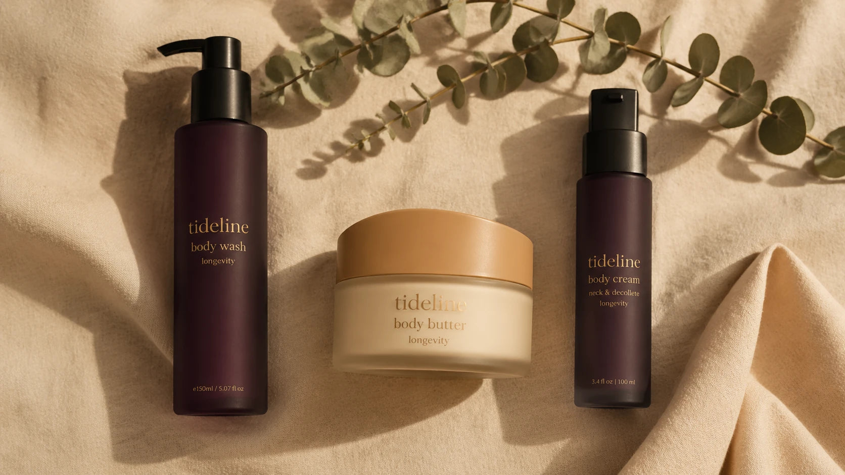 The Daily Trio shot from directly above on bone-cream linen with a sage olive sprig